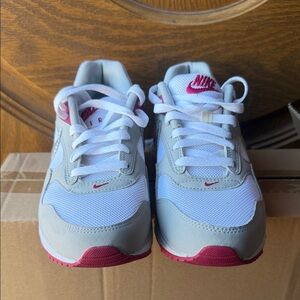 Nike Women's Gray and Pink Sneakers with Silver Accents